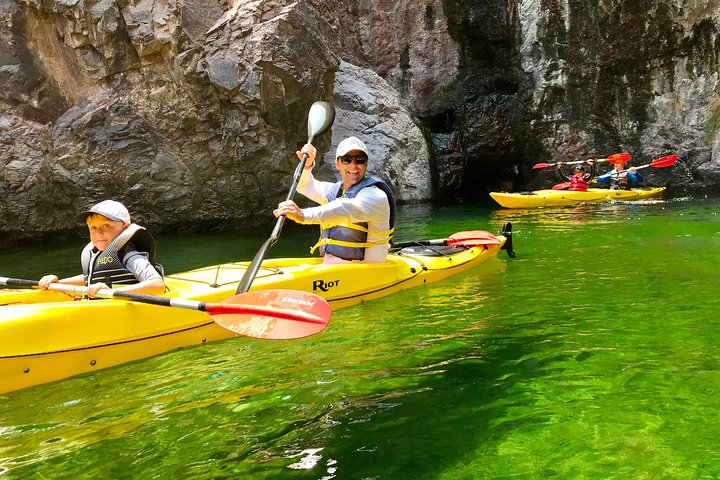 Paddle through the stunning emerald waters of the Colorado River surrounded by majestic rock formations. Enjoy a day of adventure exploration and connection with nature on your kayak tour.